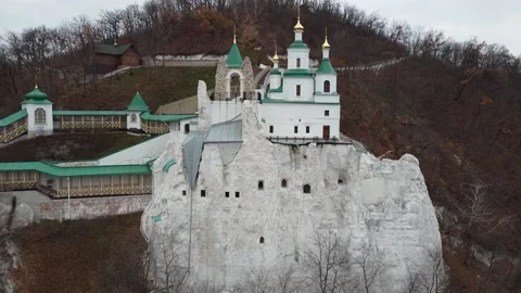 Outside view of monastic cells in chalk mountains of Sviatohirsk Cave monastery Stock Footage 178000787