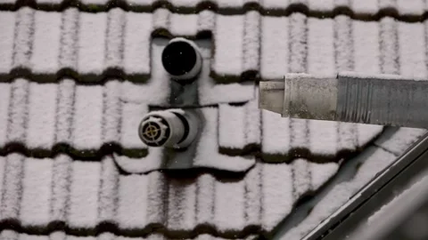 Outside view of pipe from a gas boiler in winter Stock Footage 242153800