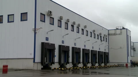 Outside view to production warehouse in winter Video stock 60833764