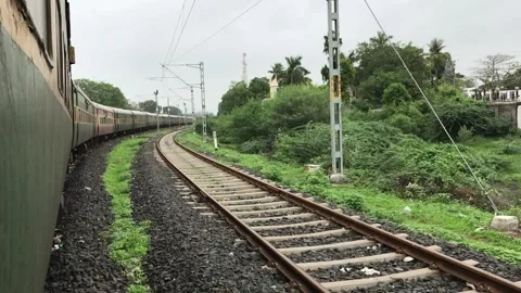 Outside view from running train Garib Rath Express. Stock Footage 130779471