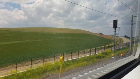 Outside view through the window of high speed train Stock Footage 115522877