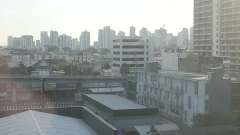 Outside view while riding airpiort rail link skytrain with local landscape .. Stock Footage 234096502