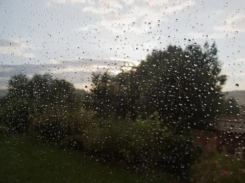Outside the window it's raining Stock Photos