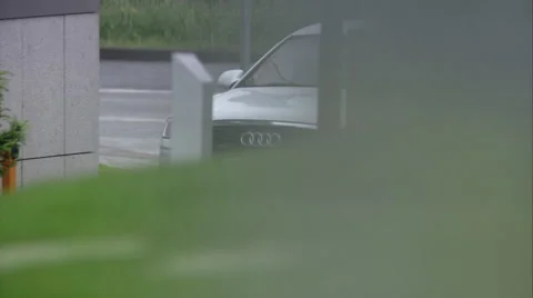 Outstanding Audi A8 L, white limousines approaching business center, front view Stock Footage 49760469