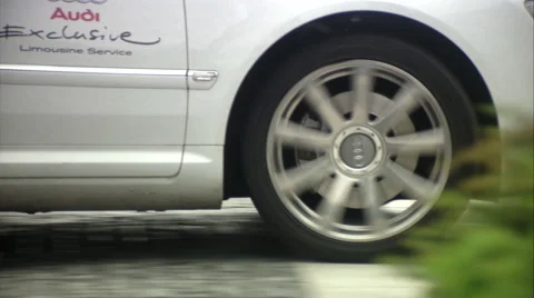 Outstanding Audi A8 L, white limousines approaching business center, wheels Video stock 49760845