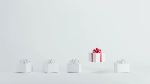 Outstanding white gift box with red ribbon floating  among white gift boxes o 스톡 동영상 119012489