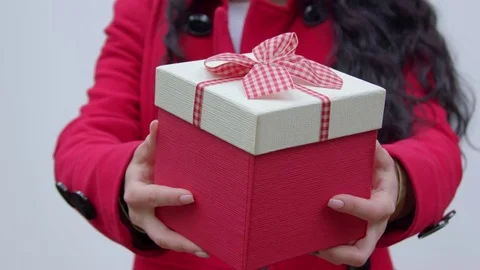 Outstretched hands with a gift Stock Footage 76678597