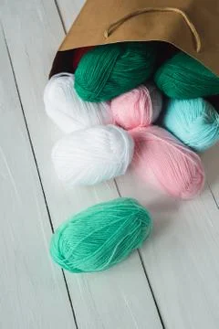 Oval acrylic wool yarn thread skeins with kraft package Stock Photos
