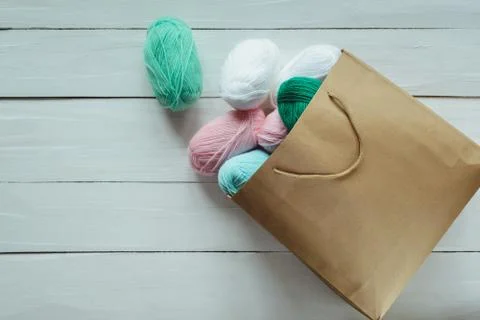 Oval acrylic wool yarn thread skeins with kraft package Stock Photos