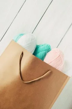 Oval acrylic wool yarn thread skeins with kraft package Stock Photos