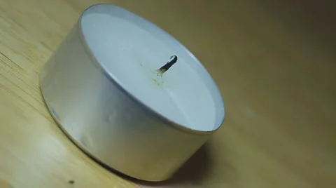 Oval Candle Being Lit Video stock 1230484