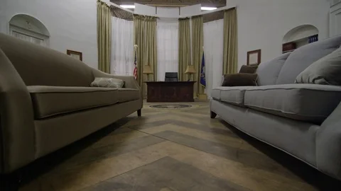 Oval Office Low Angle Gimbal approach to desk Stock Footage 72970798