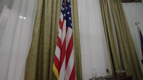 Oval Office Pull back from American Flag Stock Footage 72971510
