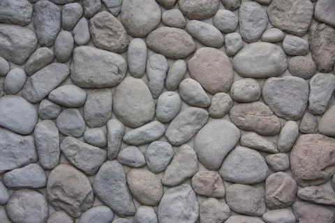 Oval stone wall Stock Photos