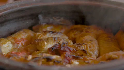 Oven Baked Cabbage Rolls In Clay Pot/ Sarmale Stock Footage 153692646