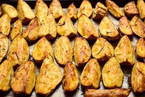Oven baked potatoes Stock Photos