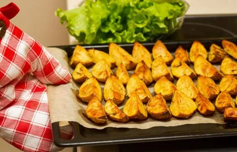 Oven-baked potatoes Stock Photos