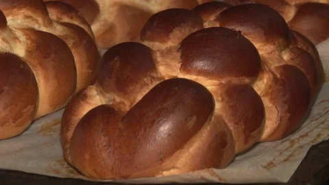 The oven in the bakery. Hot fresh bread leaves the industrial oven in a bakery.  Stock Footage 169050300