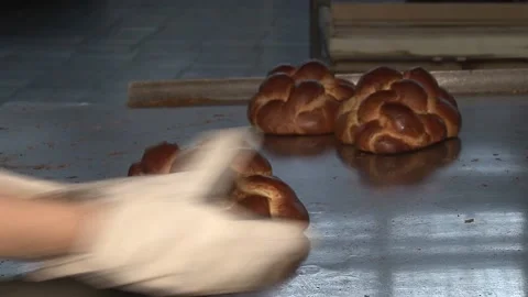 The oven in the bakery. Hot fresh bread leaves the industrial oven in a bakery.  Stock Footage 169050313