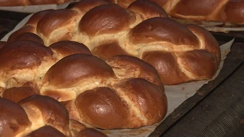 The oven in the bakery. Hot fresh bread leaves the industrial oven in a bakery.  Stock Footage 169050406