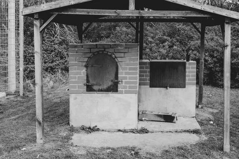 An oven for baking bread stands outside Stock Photos