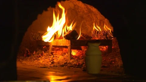 Oven with a bright flame with a clay pot 스톡 동영상 112441477