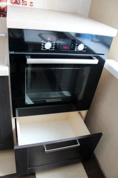 Oven built into kitchen Locker. Stock Photos