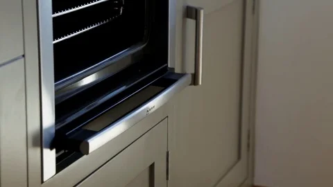 Oven door being opened and closed Stock Footage 73268480