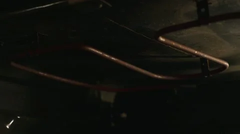 Oven elements glowing red hot Stock Footage 49923219