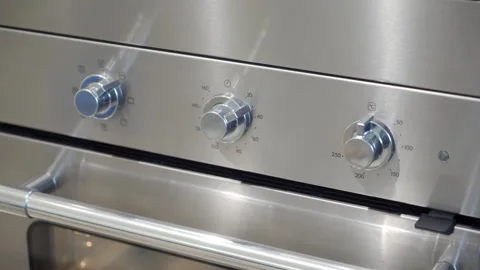 Oven Knobs Adjusted on Stainless Steel Panel, Setting Temperature for Cooking. 스톡 동영상 320847977