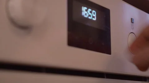 Oven knobs switched off and buttons pushed flush into front panel 動画素材 265569800