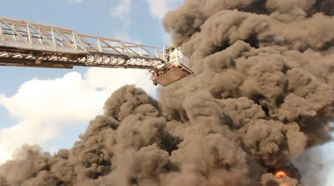 Over 120 firefighters battle blaze in packaging factory Stock Footage 39765553