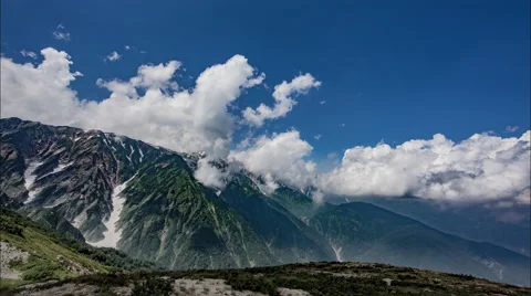 Over 5K Time Lpase - Clouds and Mountain Stockbeeldmateriaal 62554555