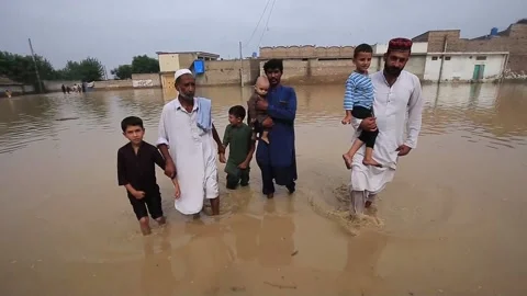 Over 900 dead after flash floods in Pakistan, CHARSADDA, PK - 27 Aug 2022 Stock Footage 205511946