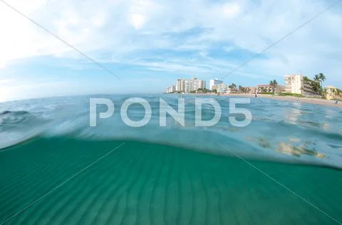Over and under picture at a beach. Stock Photos