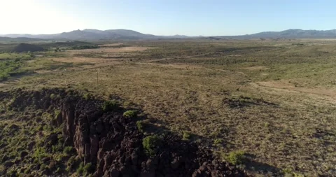 Over Basalt Cliffs Along Kirkland Creek (North Side) Stock Footage 133000770