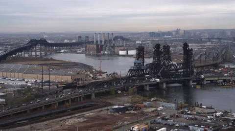 Over bridges on the Passaic River in Jersey City, heading toward heliports. Shot Stock Footage 59170137