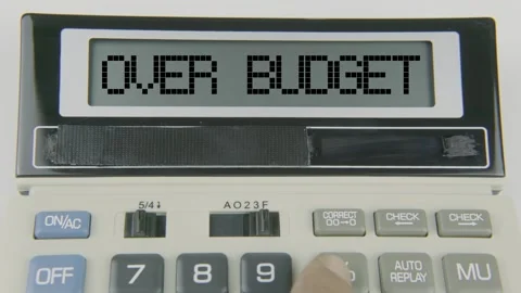 Over Budget Text or Words and Hand Typing  Concept Calculator Stock Footage 307046672
