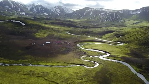 Over Camp in Iceland River Valley With Distant Mountains Stock Footage