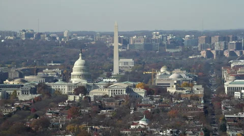 Over Capitol Hill, looking toward National Mall with Capitol rotunda, Washington Vídeos de archivo 59210311