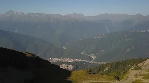 Over city in the mountains Stock Footage 99615516
