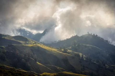 Over the Clouds along the slopes of a Volcano Stock Photos