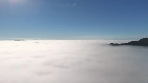 Over the Clouds - Flying through and above the clouds Video stock 320934119