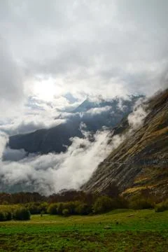 Over the clouds in high mountains, Pyrenees, foggy and cloudy Stock Photos
