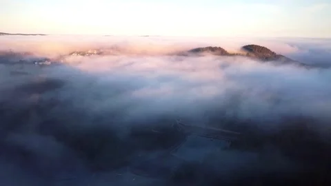Over the clouds in the middle hills Stock Footage 144341836