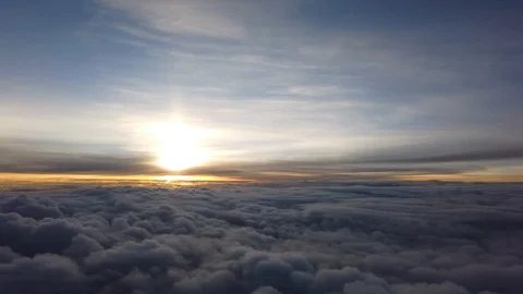 Over the clouds from the plane. Stock Footage 130016479