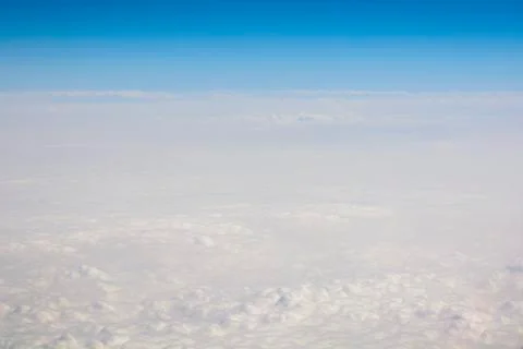 Over clouds of the sky Stock Photos