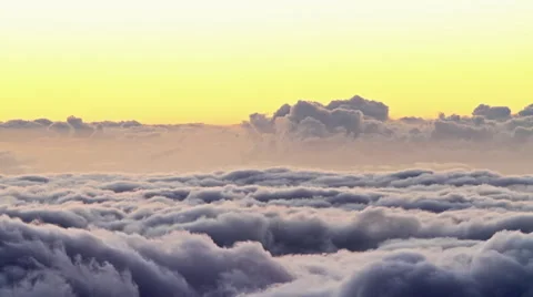 Over clouds at sunset, time lapse Stock Footage 48592839