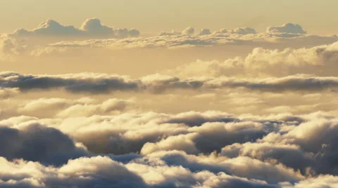 Over clouds at sunset, time lapse Stock Footage 55511163