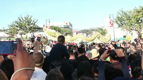 Over the Crowd Dragon Dance 2 Stock Footage 10836475